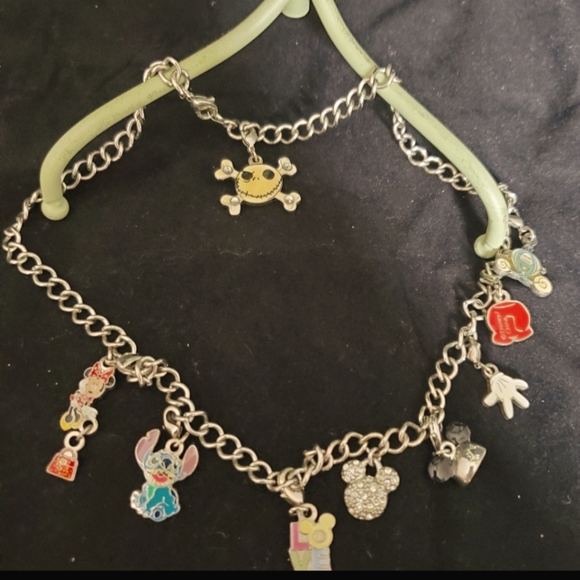 Disney Other - 2 Disney Necklacea with charms